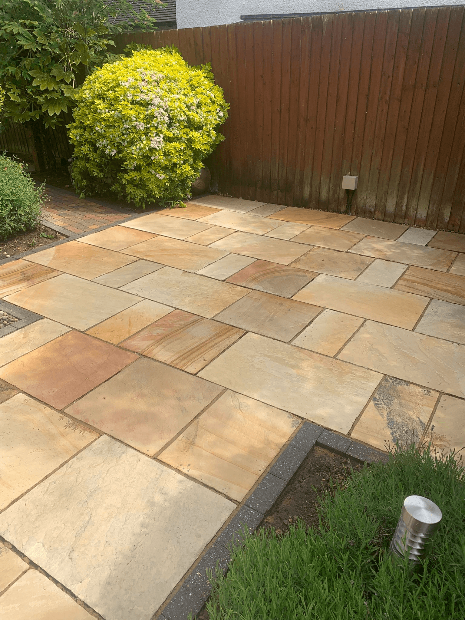 Sandstone patio after jet washing
